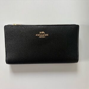 Coach Black Leather Wallet with Gold Accents